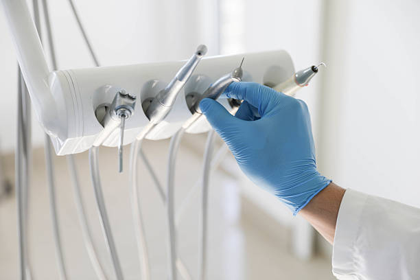 Professional Tooth Extraction technician working in Goochland County County, VA